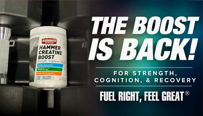 Creatine Boost next to weights